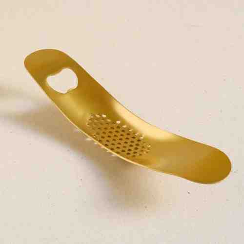 Harriet and Co Gold Garlic Press and  Bottle Opener