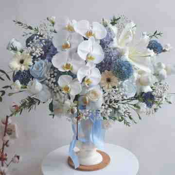 The Elegance of Dusty Blue Vase Arrangement
