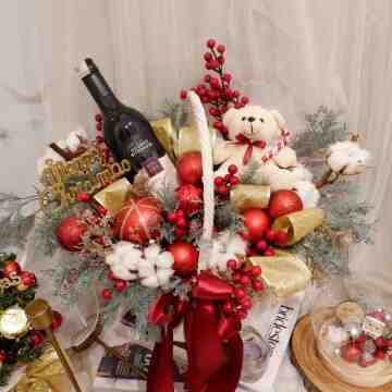 Christmas with Wine in Basket Arrangement.